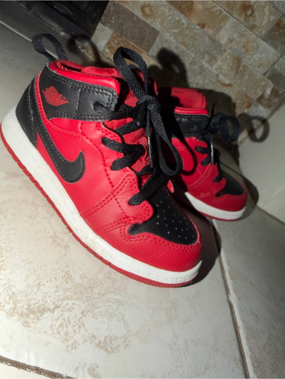 Kids Jordan Nike Red and Black High-Top Sneakers